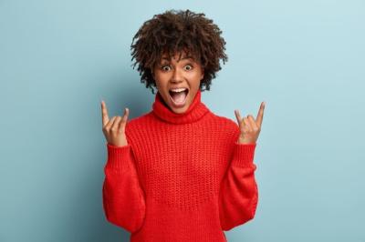 Young Woman in Red Sweater with Afro Haircut – Free Download