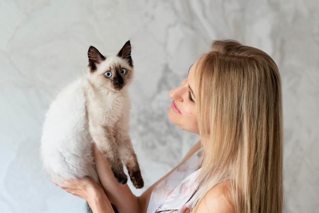 Close-Up of a Woman Holding a Cat – Free Stock Photo, Download Free