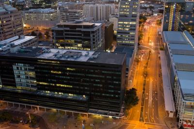 Aerial View of Streets and Office Building in Business District – Free Download