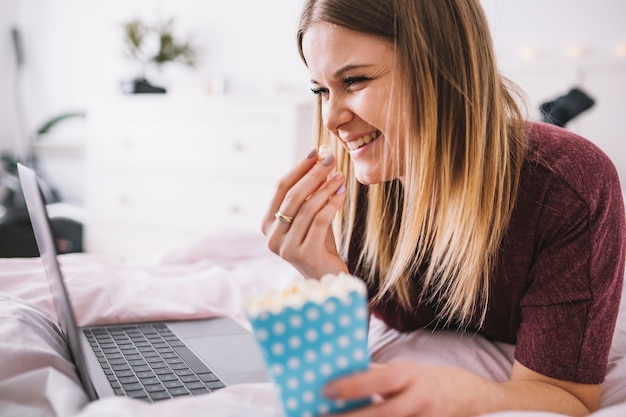 Laughing Woman Enjoying Movie with Popcorn – Free Stock Photo, Download Free