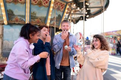 Medium Shot of Friends Enjoying a Fair – Free Stock Photo for Download