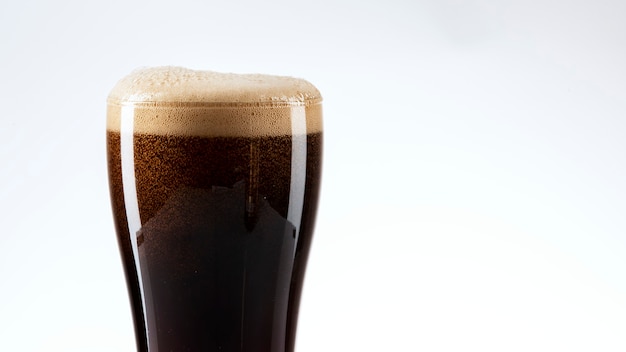 Closeup of Dark Beer with Foam – Free Stock Photo Download