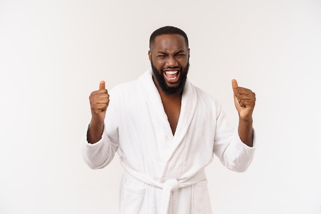 African American Man in Bathrobe Expressing Surprise and Happiness – Free to Download