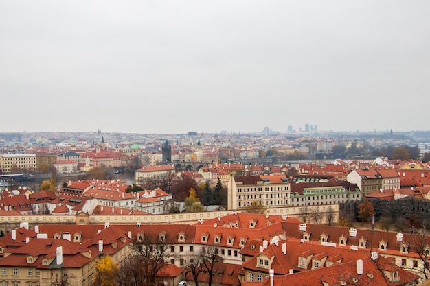 Stunning Wide Angle View of Prague’s Buildings Against a Cloudy Sky – Free Download