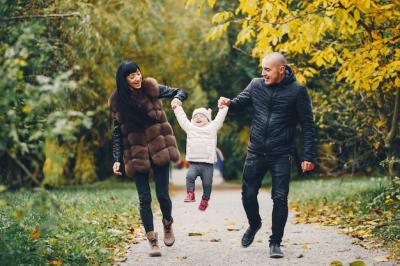 Family Enjoying Autumn in a Park – Free Download