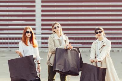 Young Happy Women Walking on Street with Shopping Bags – Free Stock Photo, Download for Free