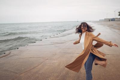 Young Girl Walking on the Beach – Free Stock Photo for Download