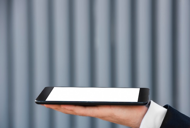 Close-up of a Businessman Holding a Tablet – Free Stock Photo, Download Free