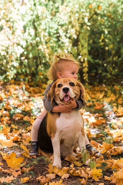 Girl Playing with Her Pet in the Forest – Free Stock Photo Download