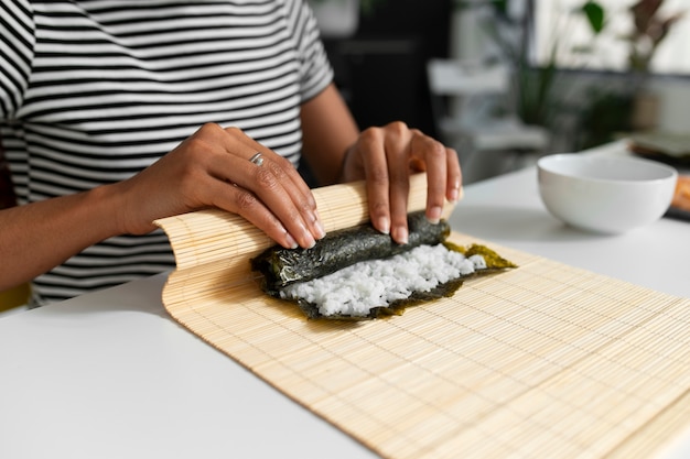 People Learning to Make Traditional Sushi Dish – Free Download