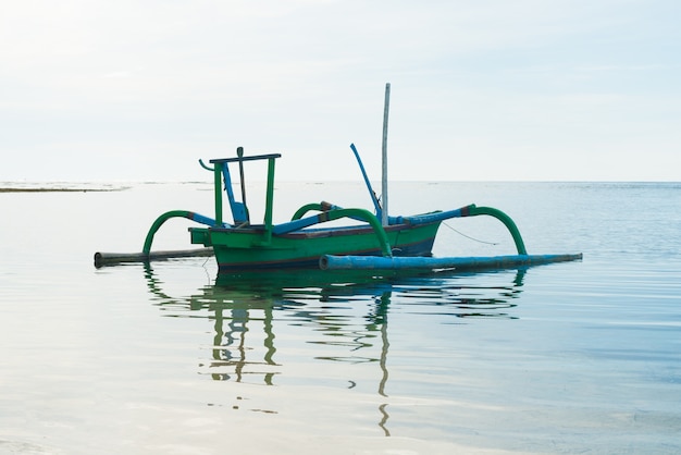 Outrigger Boat with Reflection – Free Stock Photo for Download