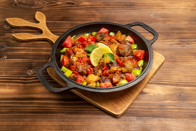 Cooked Vegetable Meal with Meat and Sliced Bell Peppers in Pan – Free Download