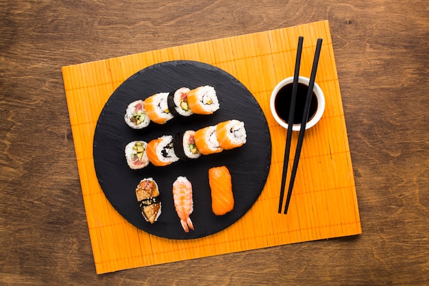 Stunning Top View Sushi Plating on Bamboo Mat – Free Download