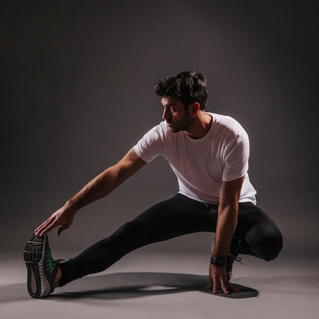 Man Exercising on Dark Background – Free Stock Photo, Download for Free