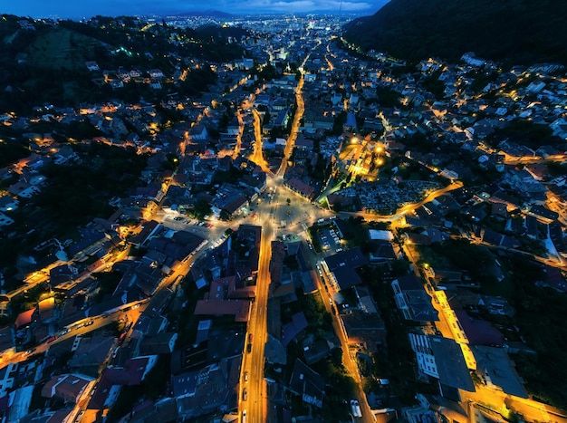 Aerial Drone View of Brasov at Night in Romania – Free Download