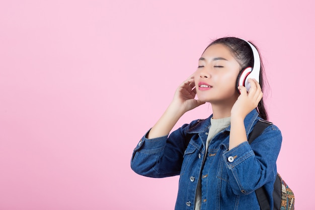 Female Tourists in a Pink Studio Background – Free Stock Photo for Download