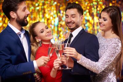 Cheerful People Celebrating with Glasses of Champagne – Free Download