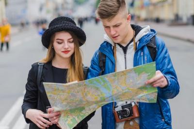 Man and Woman Reading Map – Free Download, Free Stock Photo