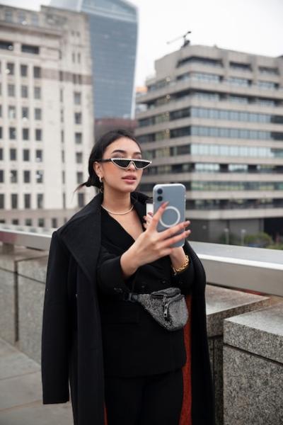 Influencer Taking a Selfie on a Bridge – Free Stock Photo for Download