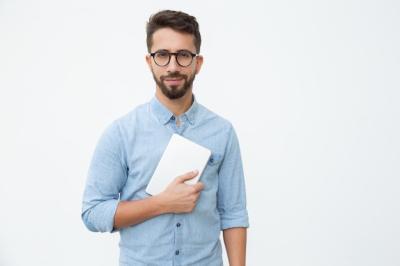 Smiling Man Holding a Digital Tablet – Free Stock Photo for Download