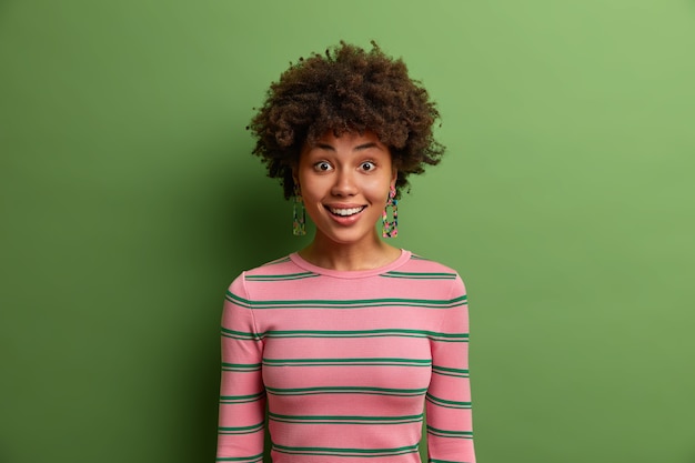 Pleased Smiling Woman with Afro Hair Indicating Cheerful Mood – Free Stock Photo, Download for Free