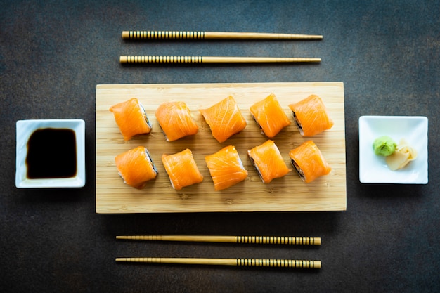 Salmon Fish Meat Sushi Roll Maki on Wood Plate – Free Stock Photo, Download for Free