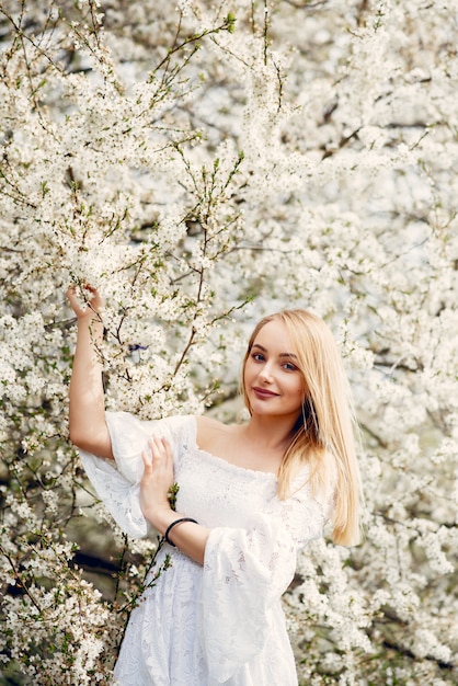 Elegant and Stylish Girl in a Spring Park – Download Free Stock Photo