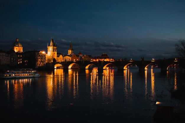 Charles Bridge in Prague Reflected in Water – Free Stock Photo for Download