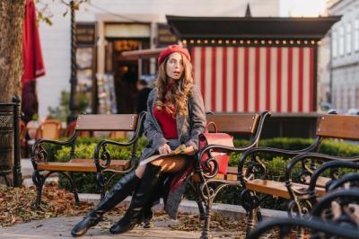 Pensive Girl in Knee High Boots Sitting on Bench – Free Download