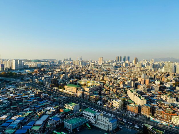 High Angle View of City Buildings Against Clear Sky – Free Stock Photo for Download