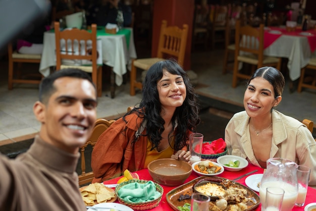 Adults Enjoying Mexican Food – Free Stock Photo for Your Projects, Download for Free