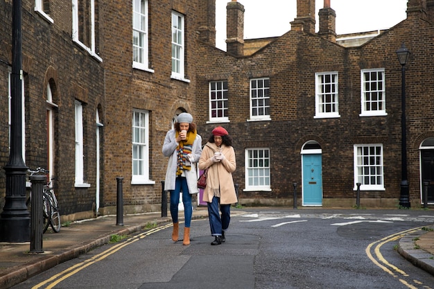 Friends Walking in the City – Free Stock Photo for Download