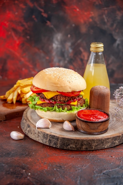 Delicious Meat Burger with French Fries on Dark Floor – Free Download