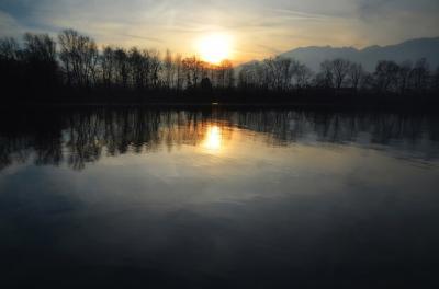 Evening Sunset over Alpine Lake Surrounded by Trees and Swiss Alps – Free to Download