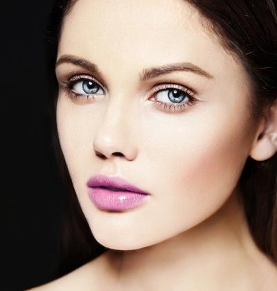 Glamorous Close-Up Portrait of a Beautiful Caucasian Woman with Perfect Skin