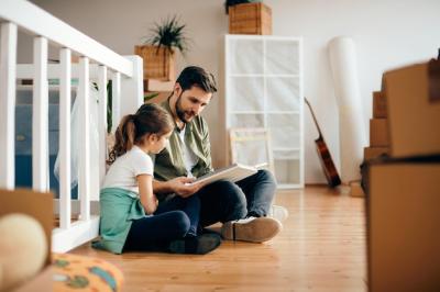 Father and Daughter Enjoying Storytime in Their New Apartment – Free Stock Photo Download