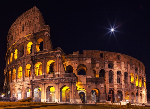 The Majestic Coliseum Illuminated at Night – Free Stock Photo for Download