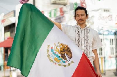 Man Holding Mexican Flag – Free Stock Photo for Download