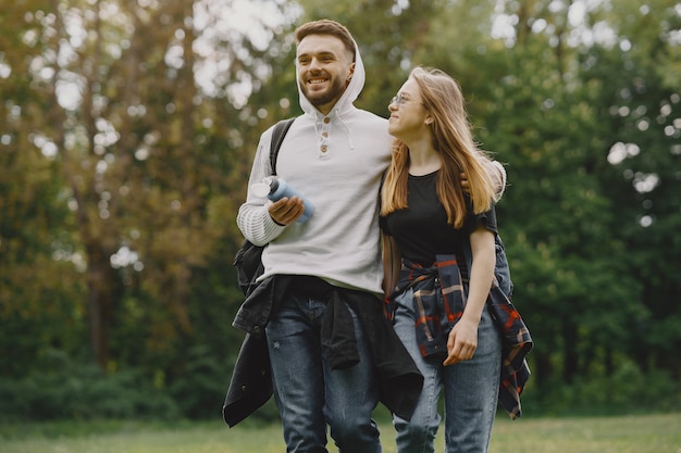 Cute Couple Relaxing in a Summer Forest – Free Download