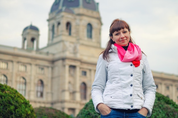 Young Traveler in White Jacket and Red Scarf at Kunsthistorisches Museum – Free Download