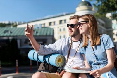 Tourist Couple Taking Selfie Outdoors – Free Download