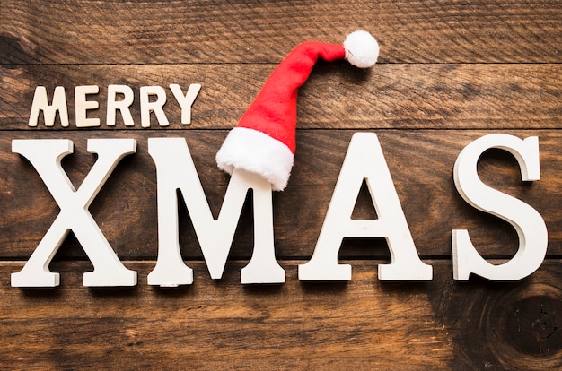 Merry Xmas Inscription on Wooden Board – Free to Download