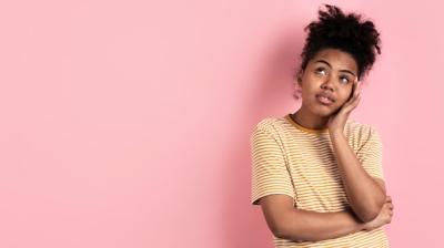 Pensive Woman Posing Thoughtfully – Free Stock Photo for Download