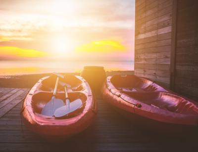 Stunning Red Kayaks at Sunset – Free Download