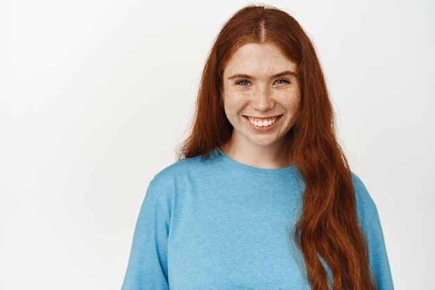 Close-Up of Smiling Natural Girl with Long Red Hair – Free Stock Photo for Download