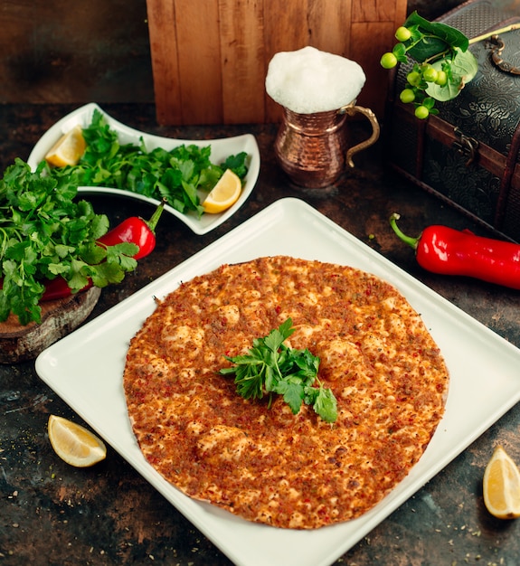 Top View of Lahmacun Turkish Pizza with Parsley, Lemon, and Ayran – Free Download