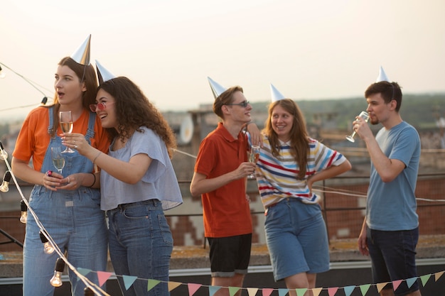 Friends Celebrating with Hats – Free Stock Photo for Download