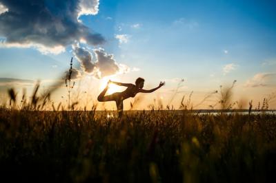 Sportive Girl Practicing Yoga in Field at Sunrise – Free Stock Photo for Download