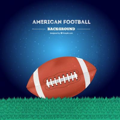 American Football Ball on the Grass – Download Free Stock Photo