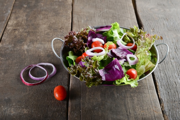 Fresh Vegetable Salad in a Bowl with Rustic Wooden Background – Free Download